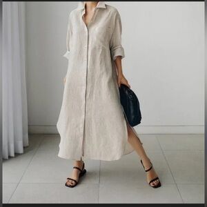 100% cotton tan button down sun dress with side slit.